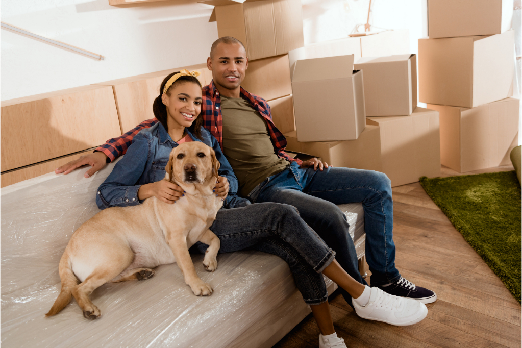 African american couple labrador dog